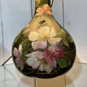 Blown glass lamp painted with a floral design, early 20th century.