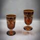 Pair of orange Bohemian glasses with monogram