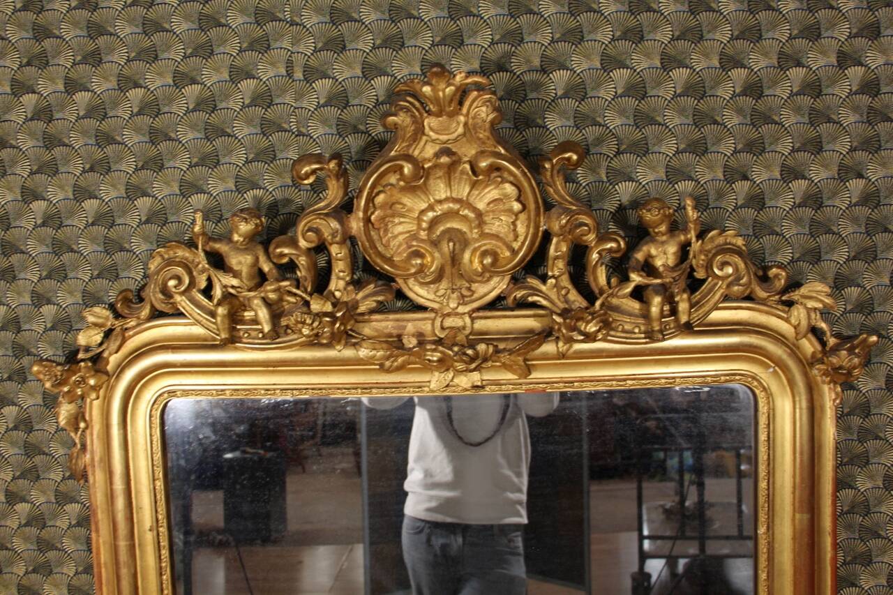 Louis Philippe mirror decorated with Putti