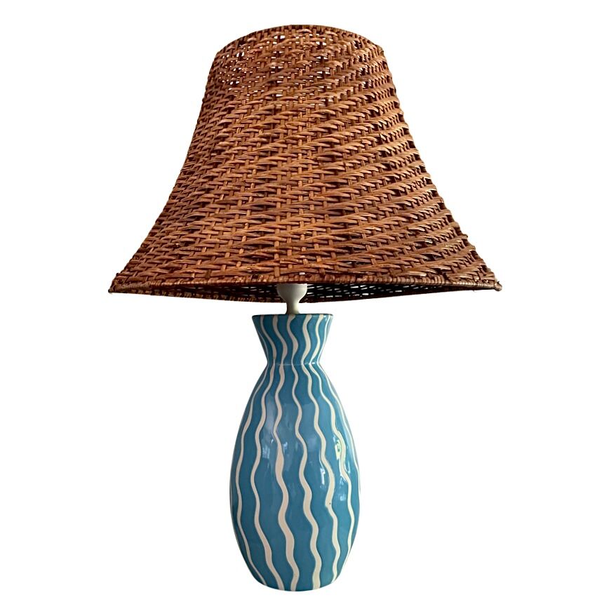 Blue ceramic lamp and rattan