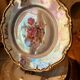 6 mismatched dessert plates decorated with roses