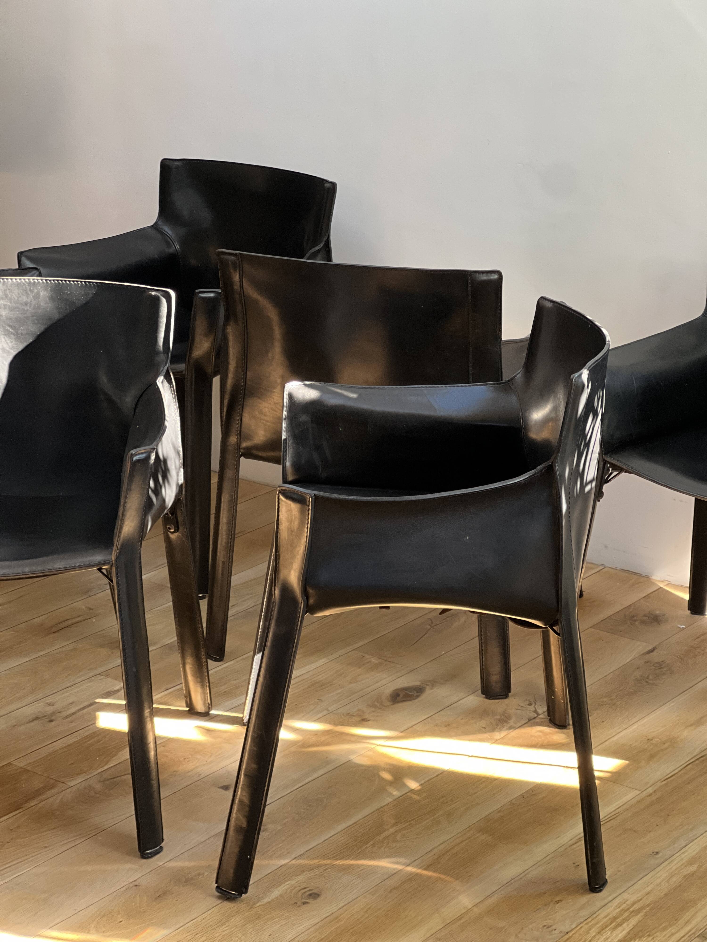 Set of 6 black leather armchairs from the 1970s