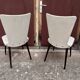 Pair of Chairs Baumann model Essor in imitation white leather, beech compass base