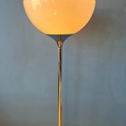Guzzini Flash Space Age floor lamp with a chrome base and white acrylic shade.
