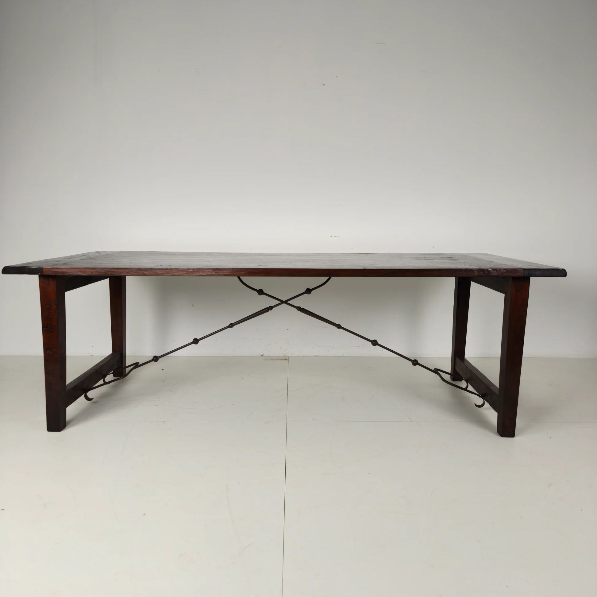 Large Spanish oak dining table with wrought iron bars – 20th century