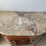 Louis XVI style half-moon chest of drawers in late nineteenth century marquetry