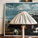 Vintage ivory ceramic lamp with gilding.