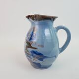Large blue pitcher with abstract pattern