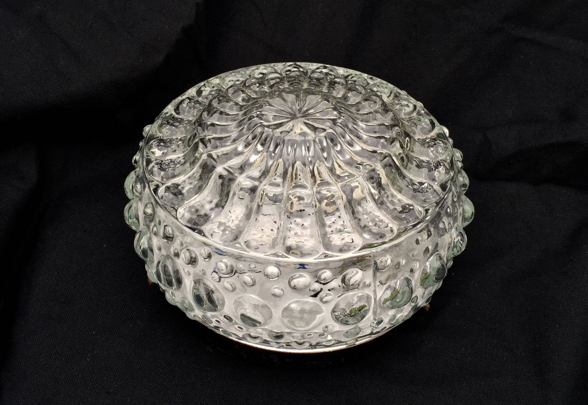 Round ceiling light or wall light in molded glass