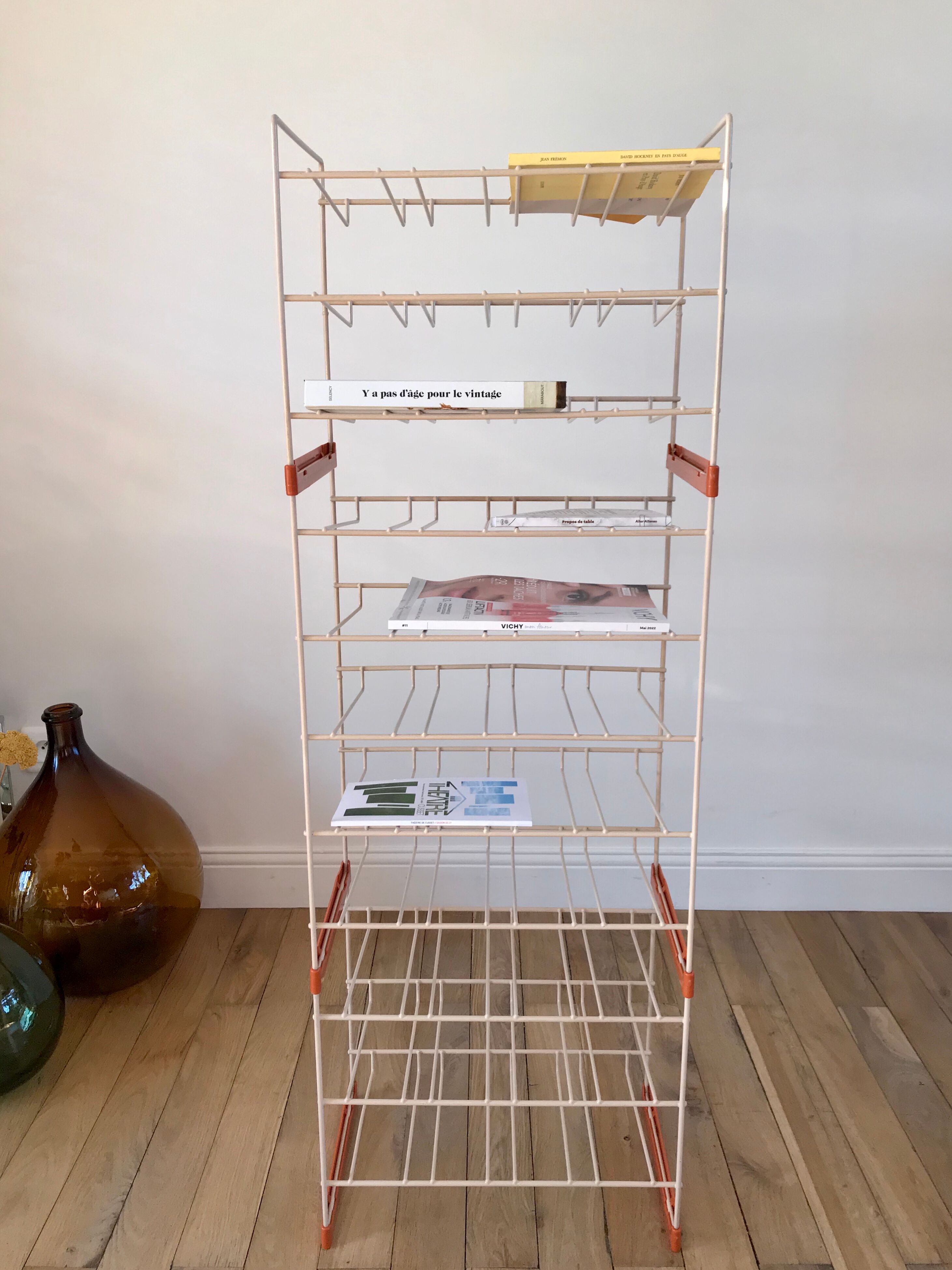 White and orange industrial shelf brand "caddie" 50s