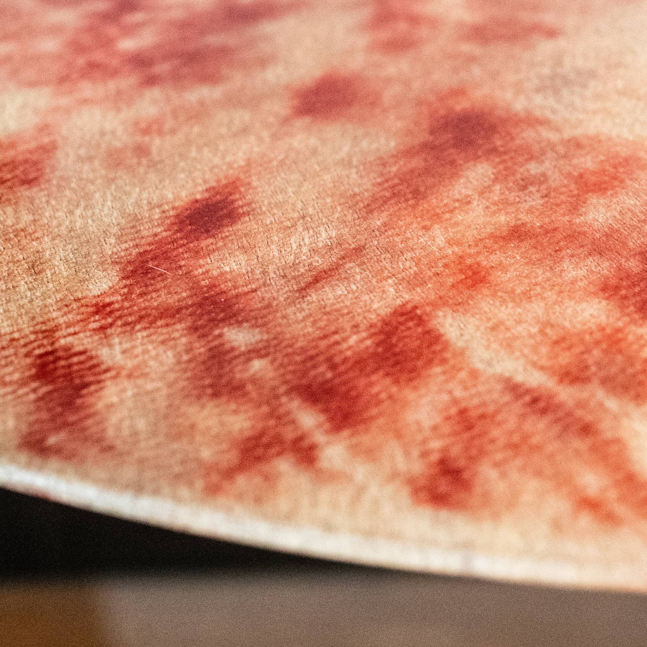 Aldo tura side table in red-dyed lacquered goatskin parchment, italy ca 1950