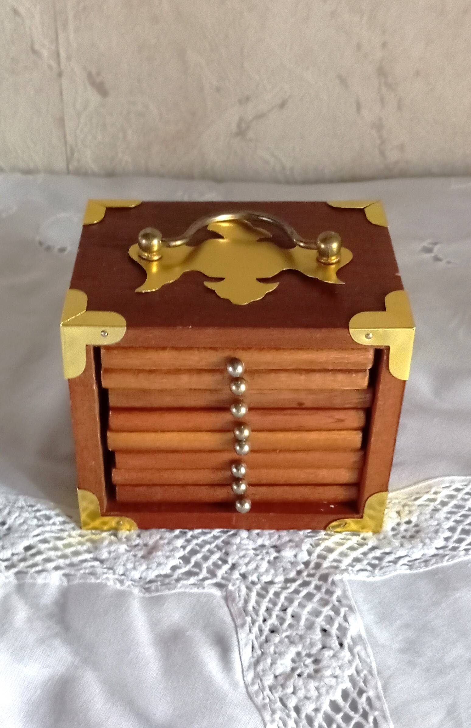 Vintage wooden and cork coaster set with decorative box