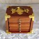 Vintage wooden and cork coaster set with decorative box