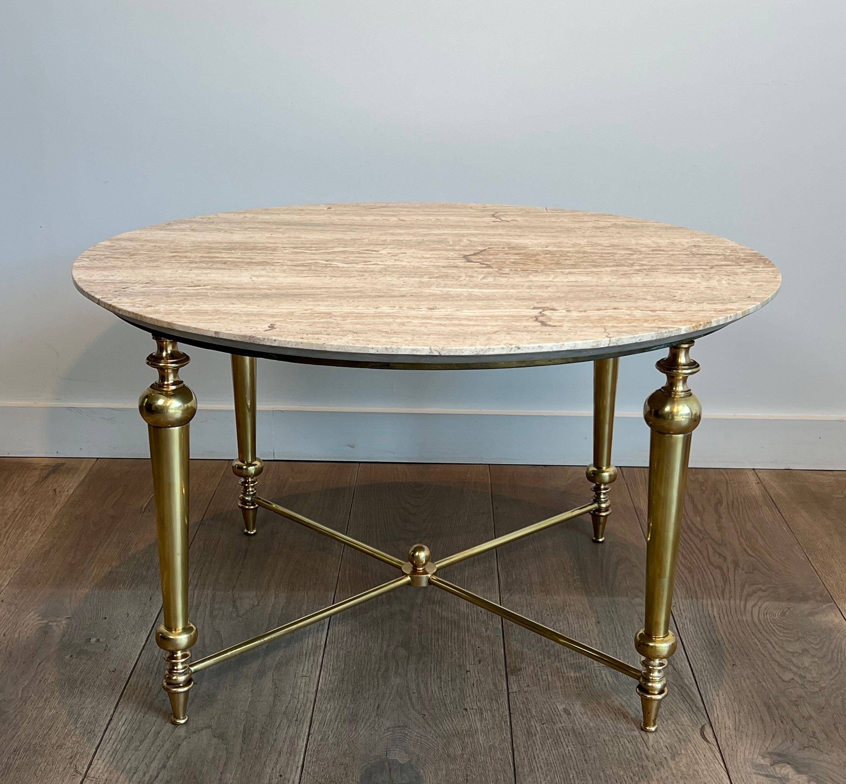 Brass coffee table with a white marble top.