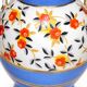 Art Deco round vase by Boch Frères Keramis, red flowers and blue bands.