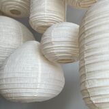 Suspension in rattan and japanese natural linen in the shape of a lantern h50 d30