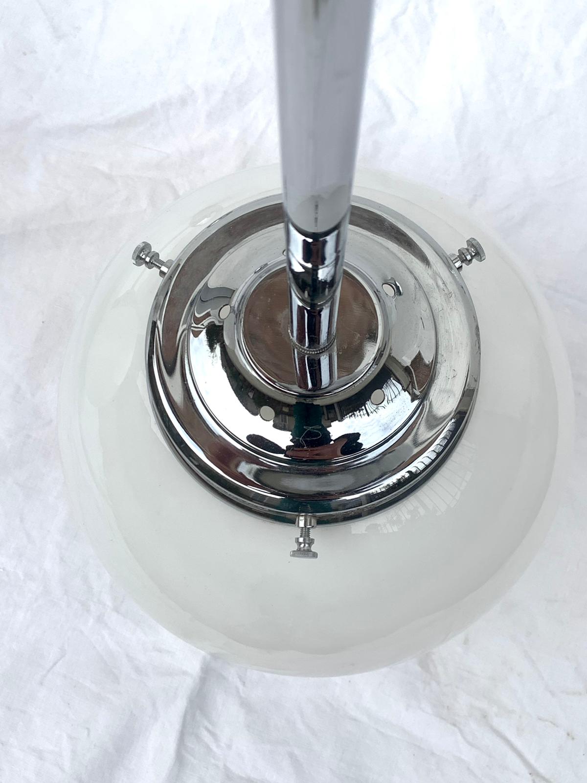 Glass and aluminum globe hanging lamp