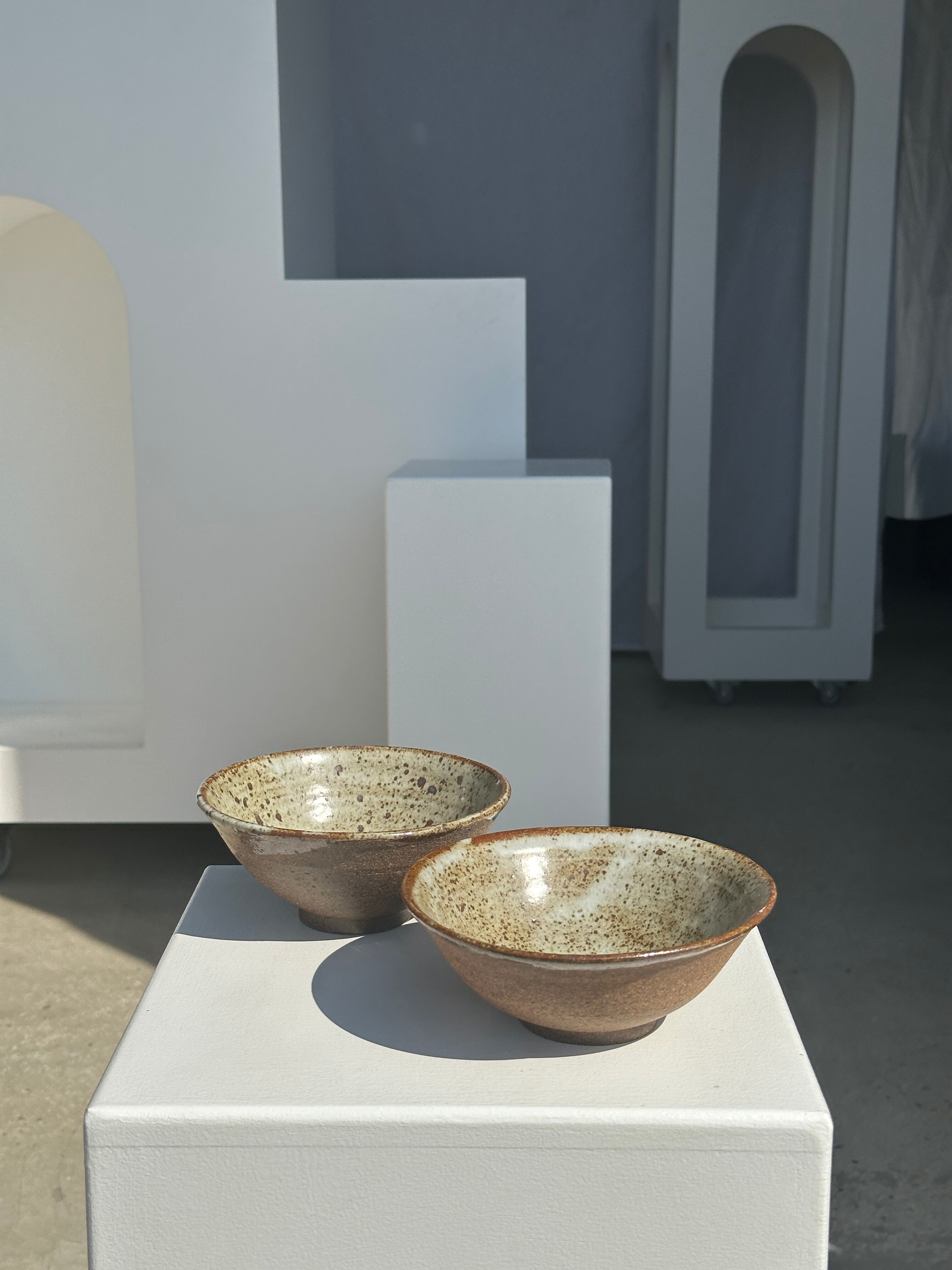 Duo of ceramic bowls interior glazed exterior matt raw earth