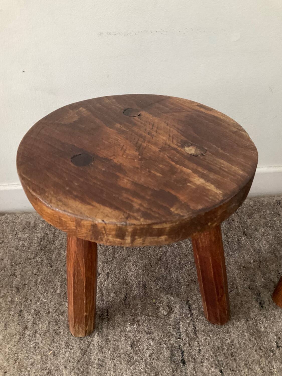 Pair of wooden tripod foot stools