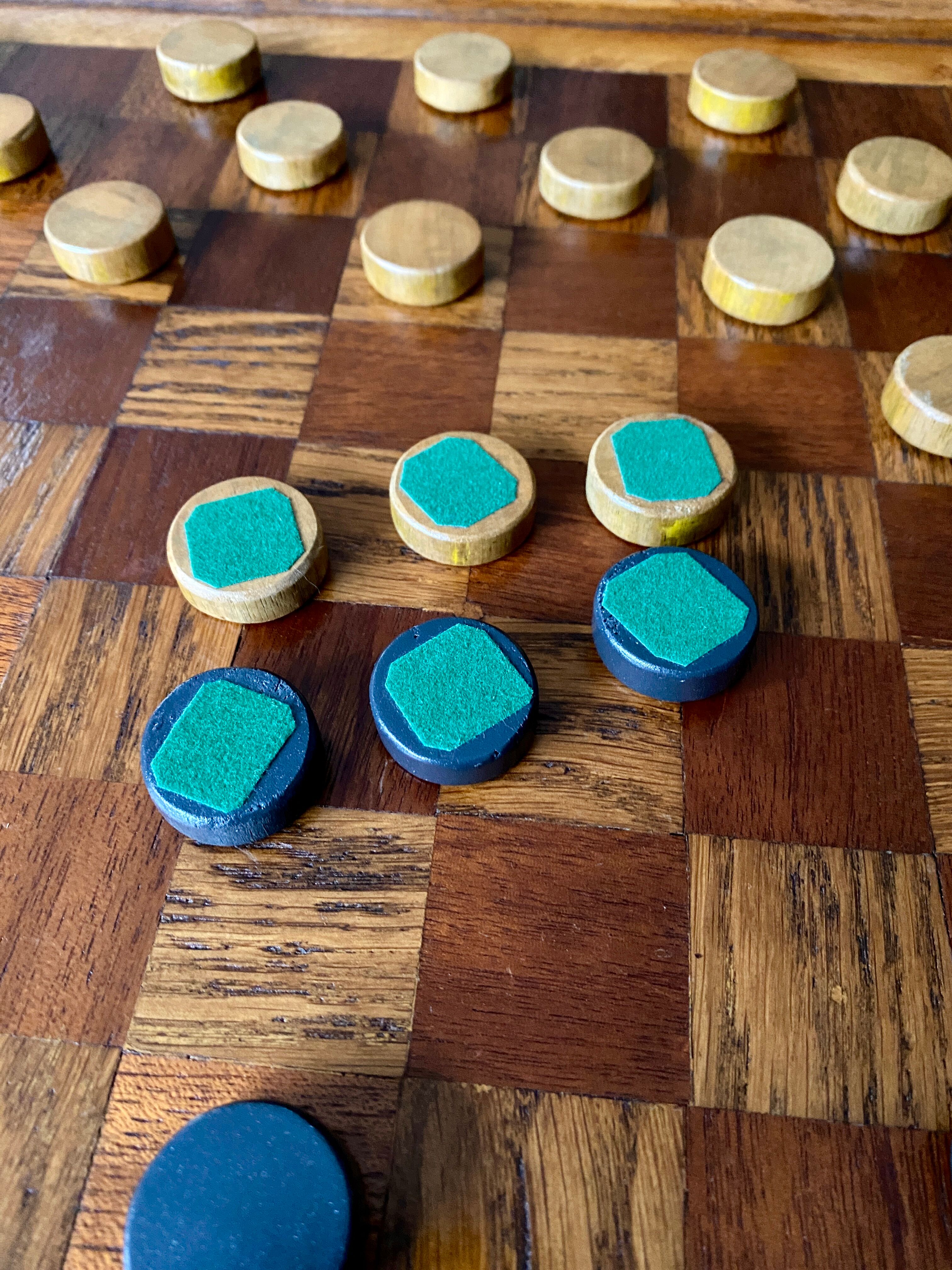 Old wooden checkers board