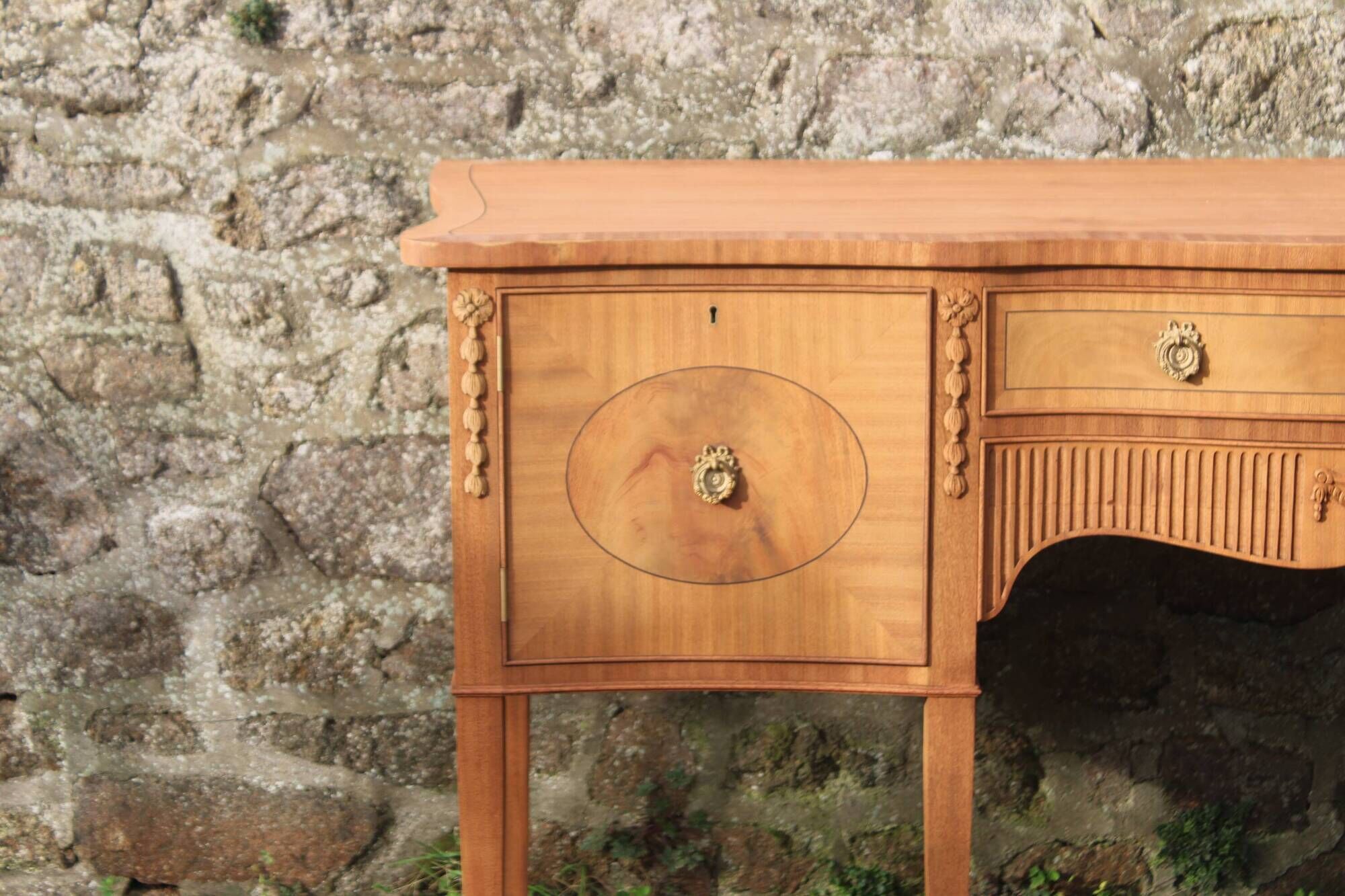 English-made enfilade in Louis XVI style with light wood veneers.