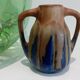 Blue enamelled flamed sandstone vase by Méténier