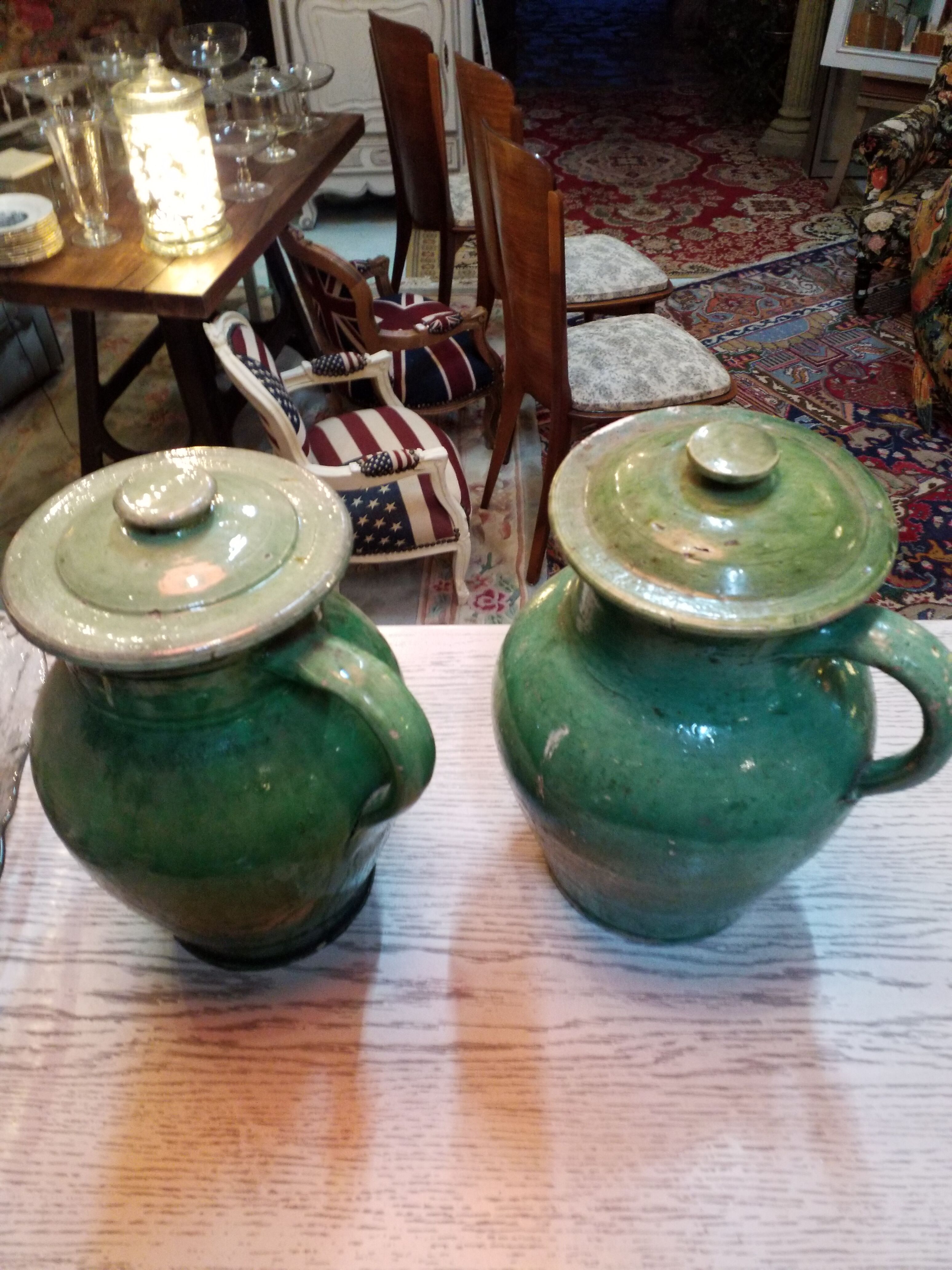 Pairs of jugs in varnished earth