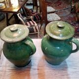 Pairs of jugs in varnished earth