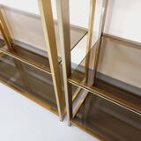 Artelano vintage bookcase shelves in gold metal smoked glass from the 70s