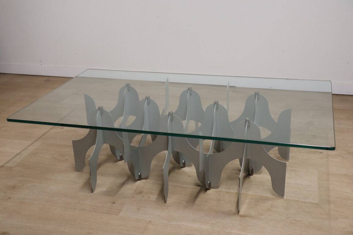 Minimalist sculptural coffee table in metal and glass