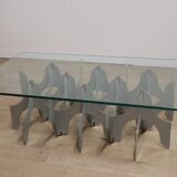 Minimalist sculptural coffee table in metal and glass
