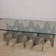 Minimalist sculptural coffee table in metal and glass
