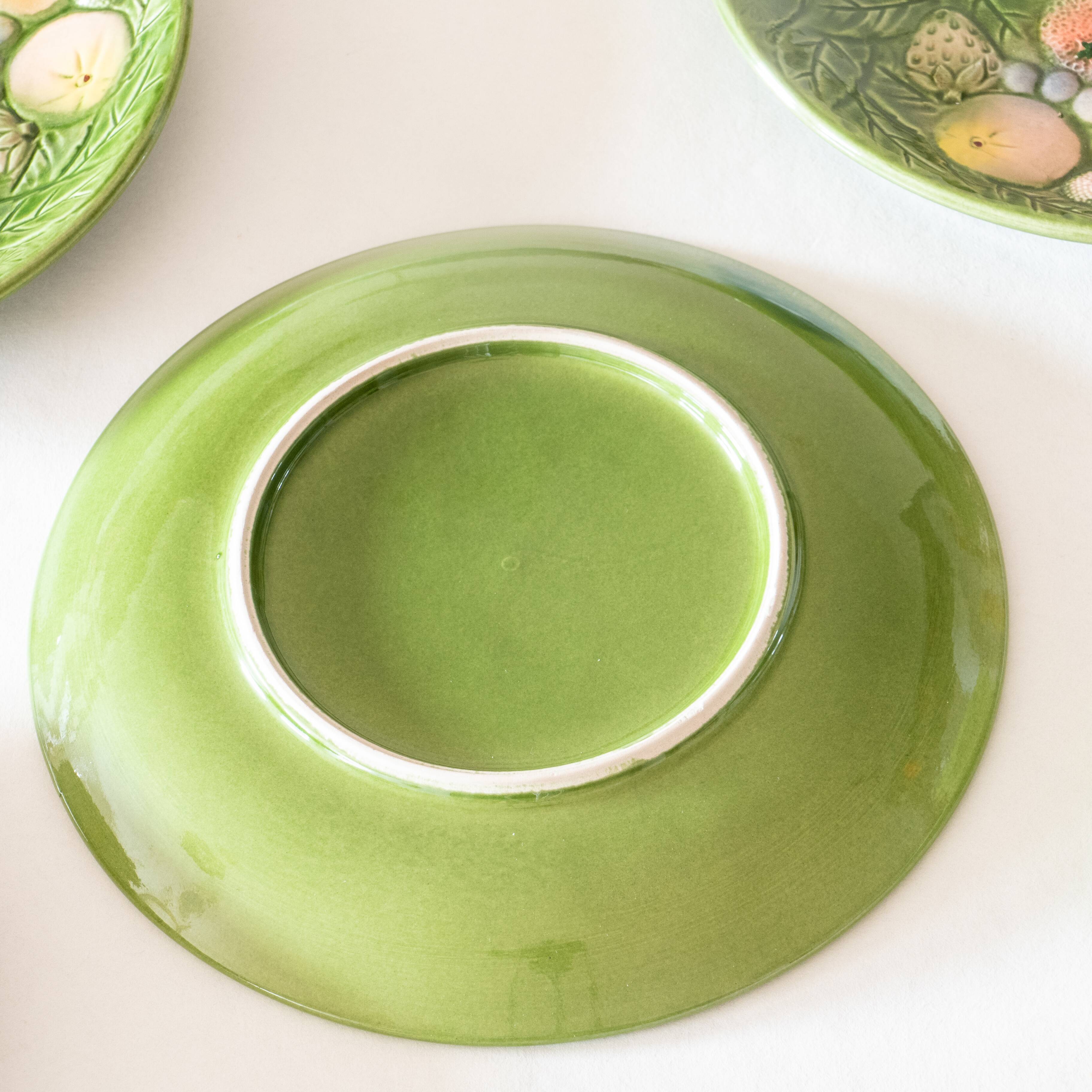 10 antique plates in fruit slip