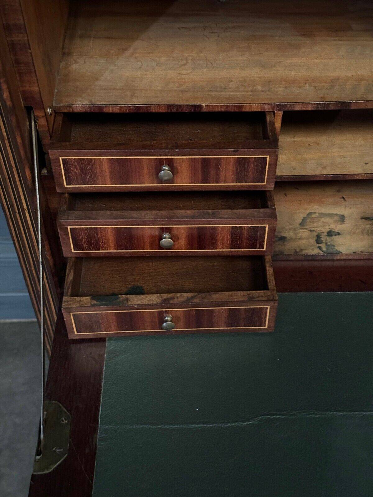 Louis XVI period secretary in monogram marquetry and white marble