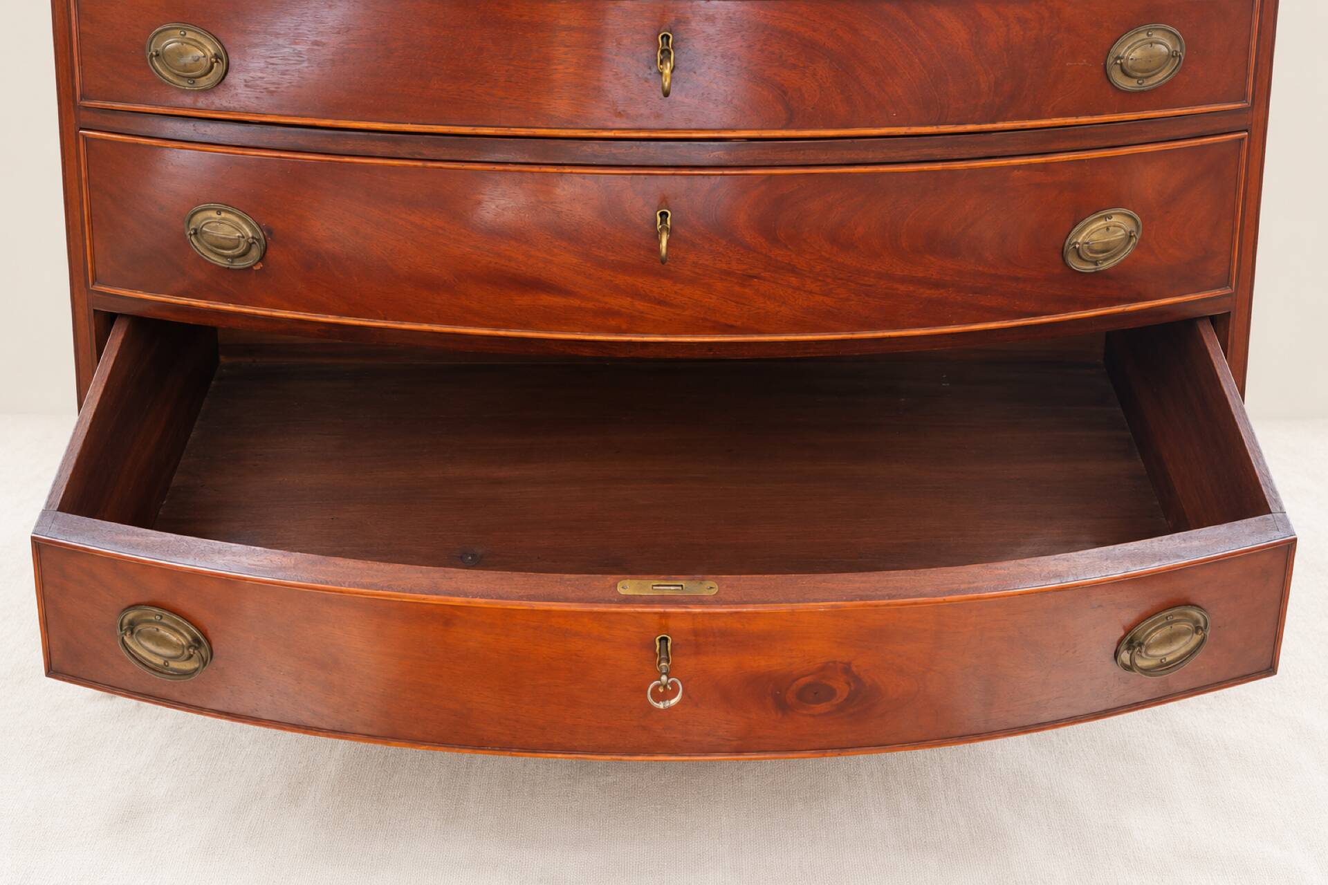 Flame mahogany drop-leaf writing desk, English style.