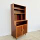 Mahogany library — closed storage and open cubbies, custom-made, 1960s.