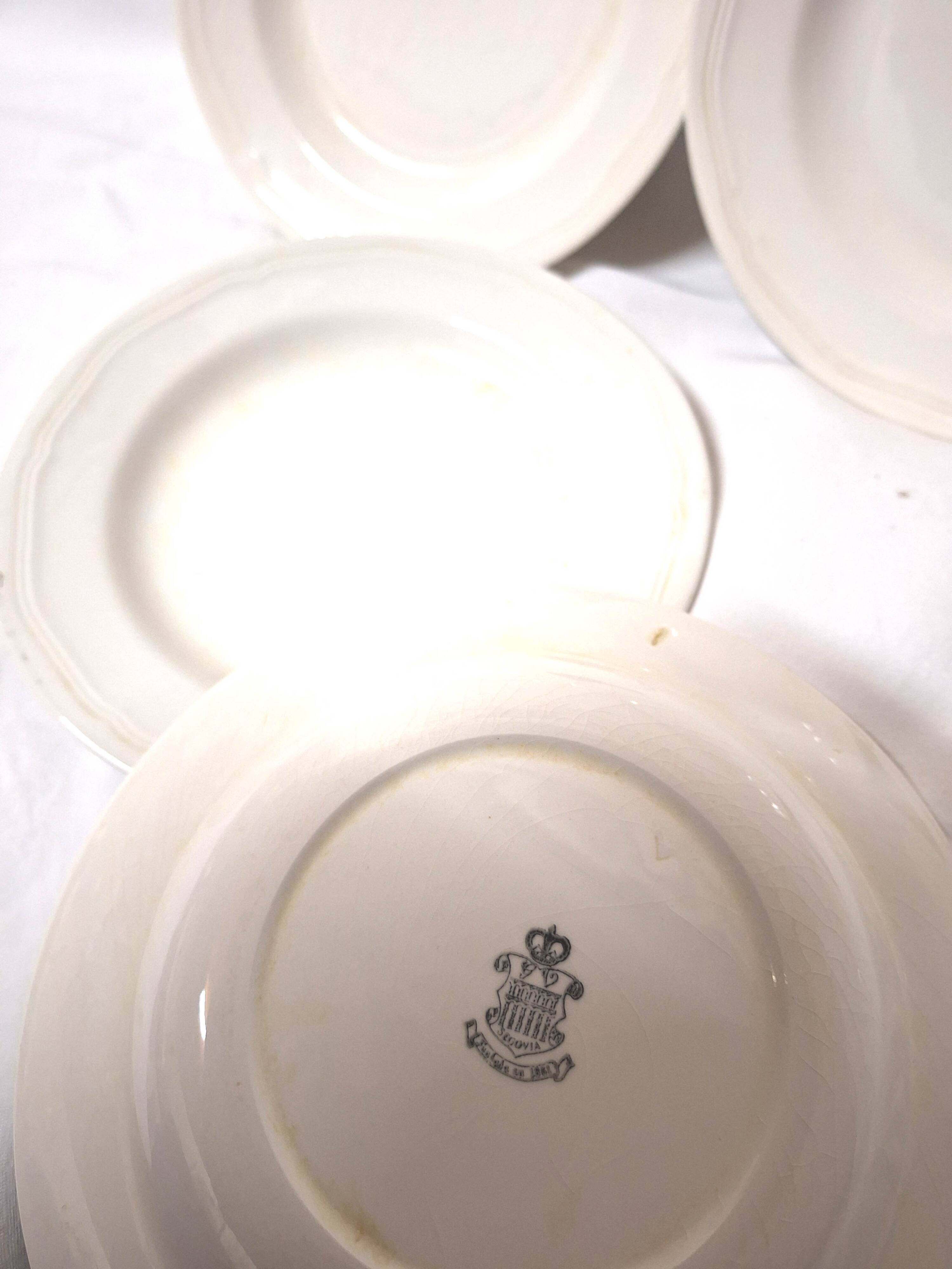 15 white earthenware plates