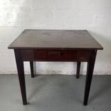 Wooden side table with drawer.