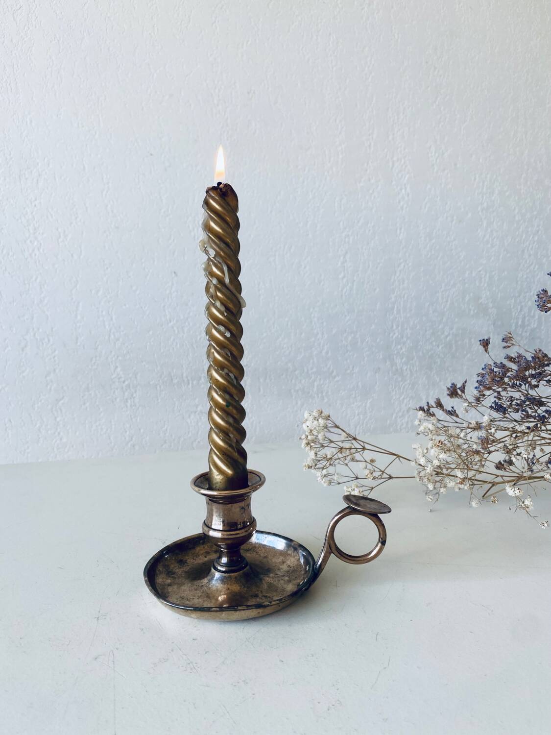 Brass thumbscrew candle holder