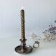 Brass thumbscrew candle holder