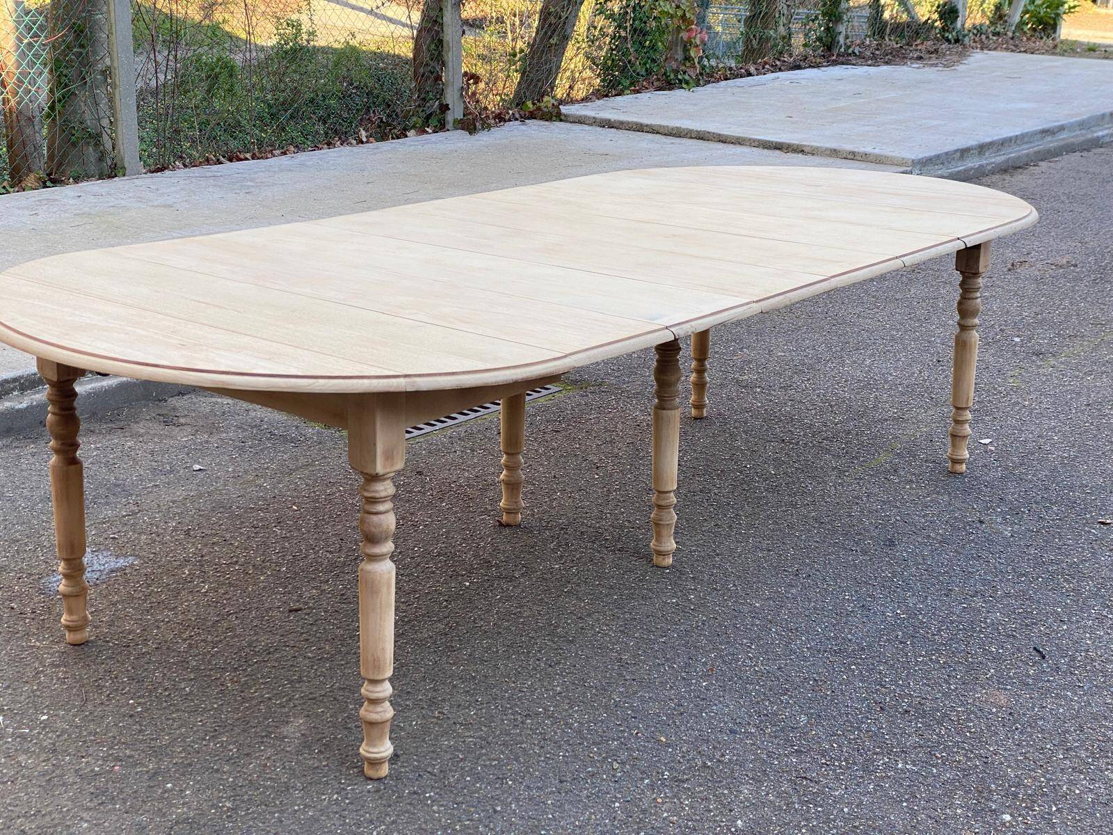 Renovated round extendable dining table with flaps, 6 extensions, 300cm.