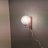 Wall light in rosewood with bobble glass ball shade.
