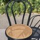 Curved wooden canework chair