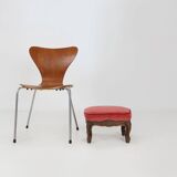 Baroque style foot stool in carved wood with coral velvet upholstery