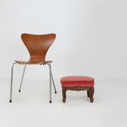Baroque style foot stool in carved wood with coral velvet upholstery