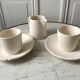 Duo of coffee cups and a Longchamp sugar bowl in 80s biscuit