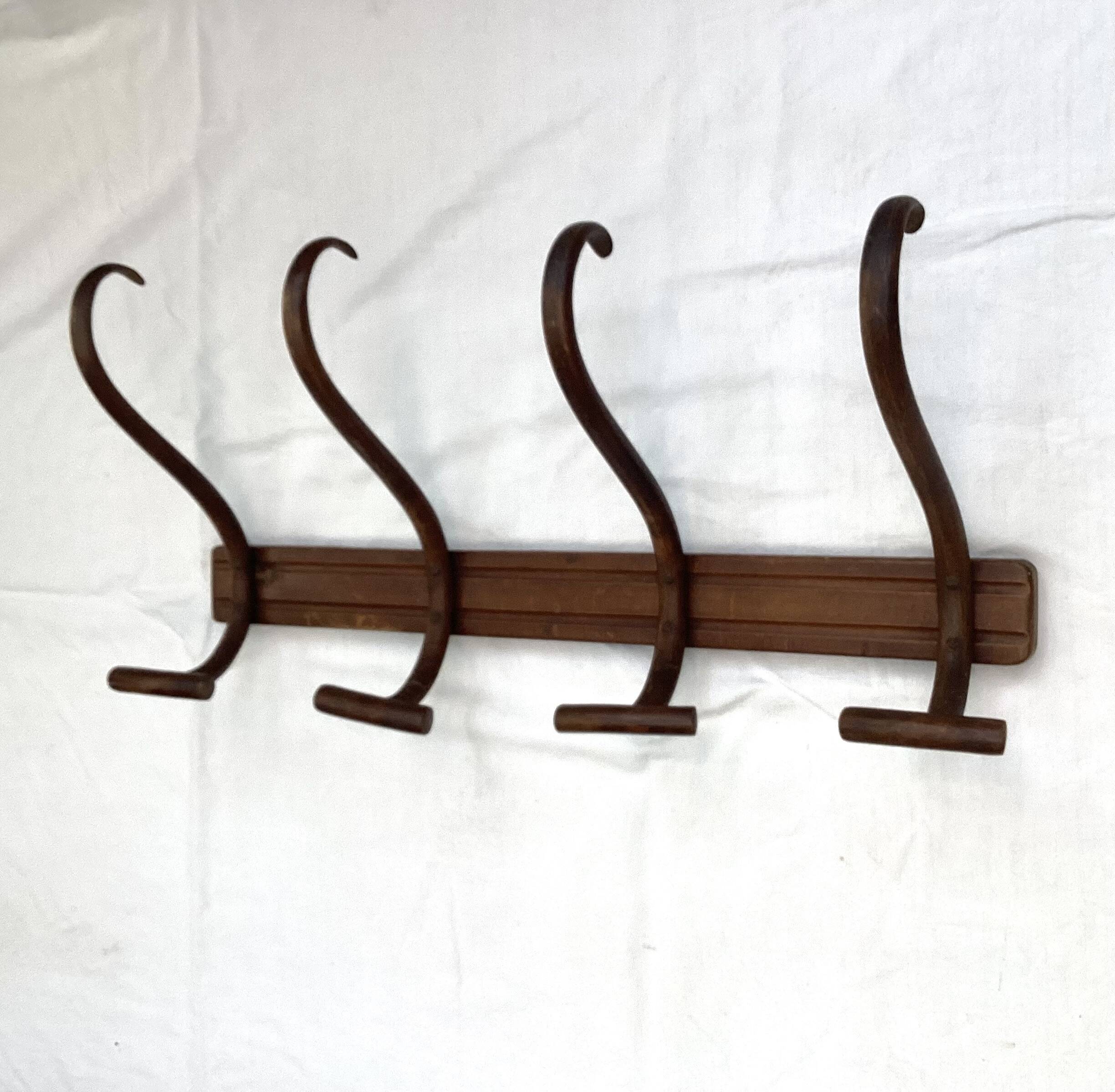 Coat rack signed Thonet with four hooks dimensions: height -32cm - width - 69cm-