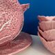 Soup tureen and bowl set with pink cabbage slip