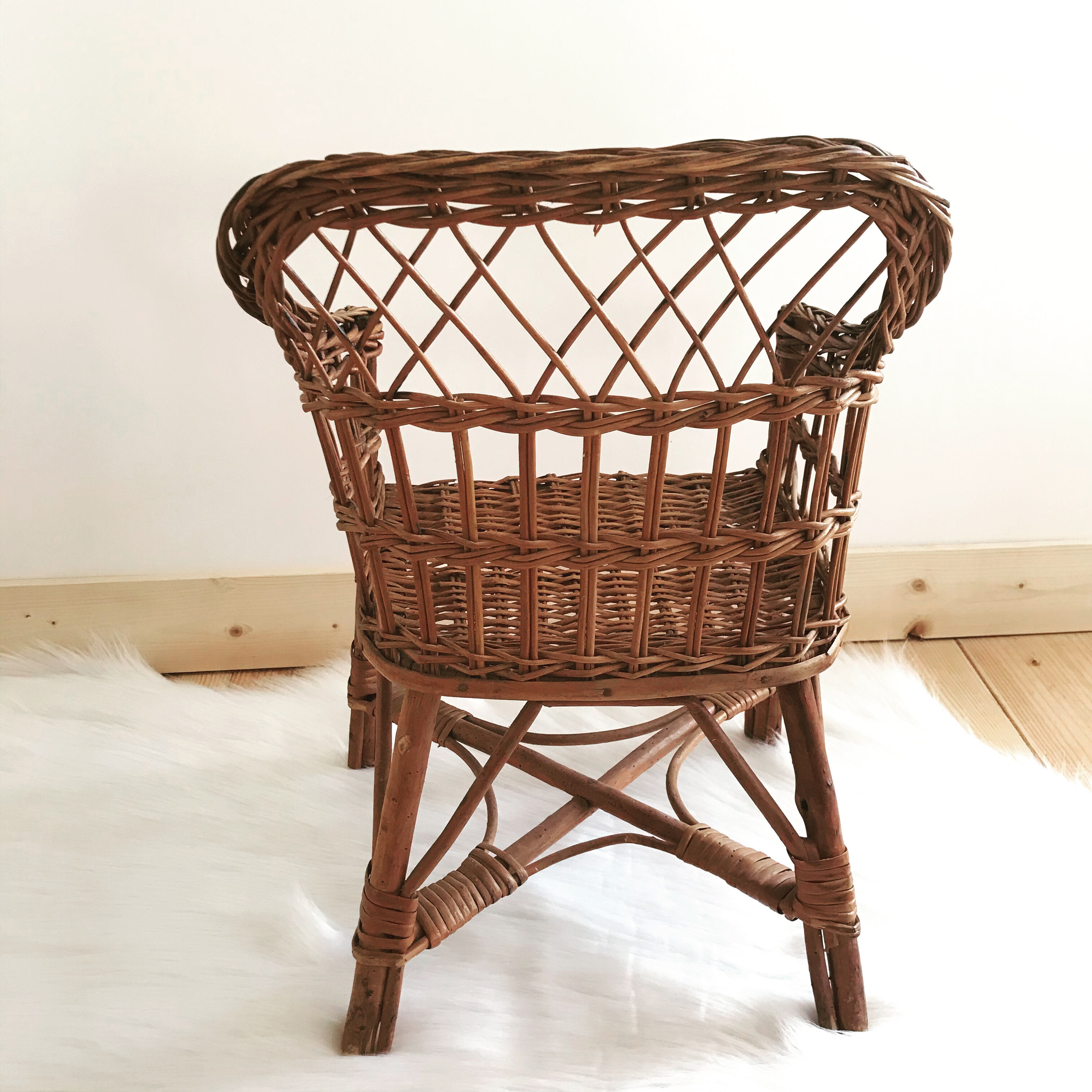 Vintage wicker children's armchair