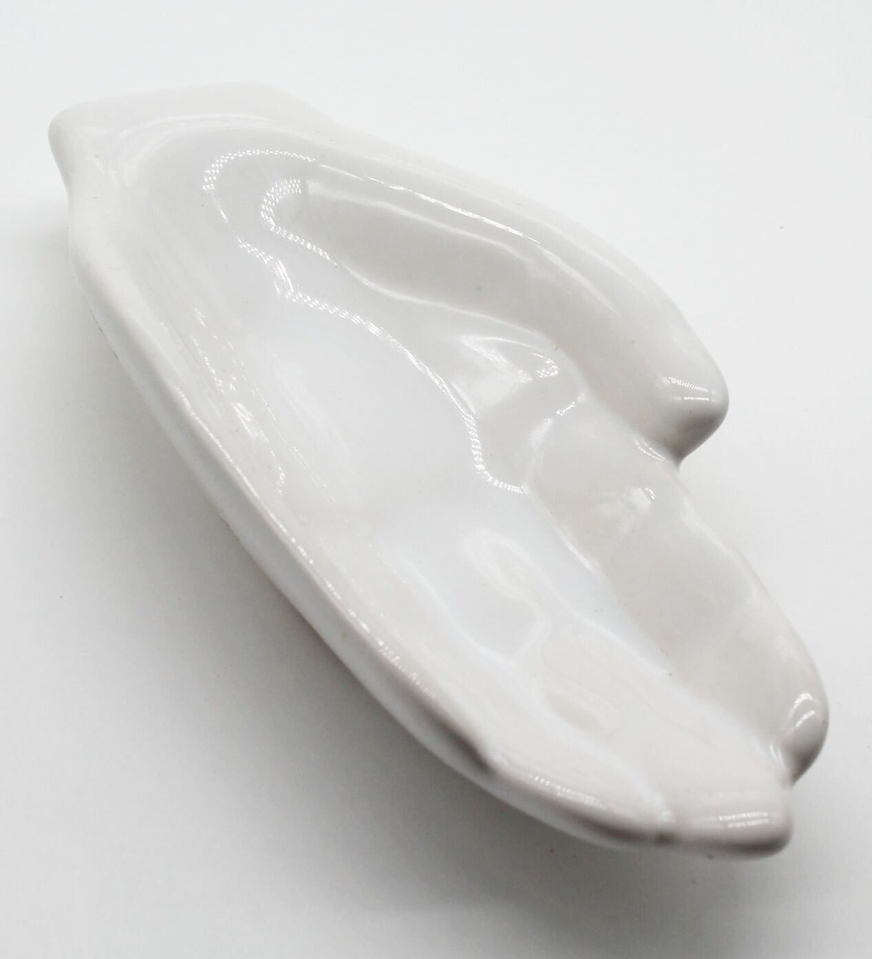 Empty white ceramic hand pocket